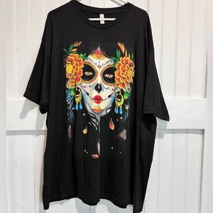 NWOT Women’s black oversize T-shirt with colorful graphic skull design. Size:3X